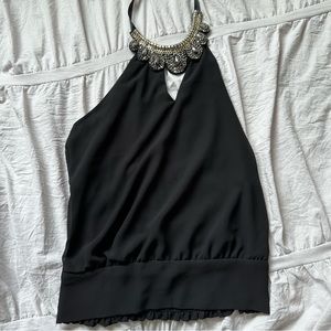 Halter style top with beaded design on neckline and scrunched elastic bottom